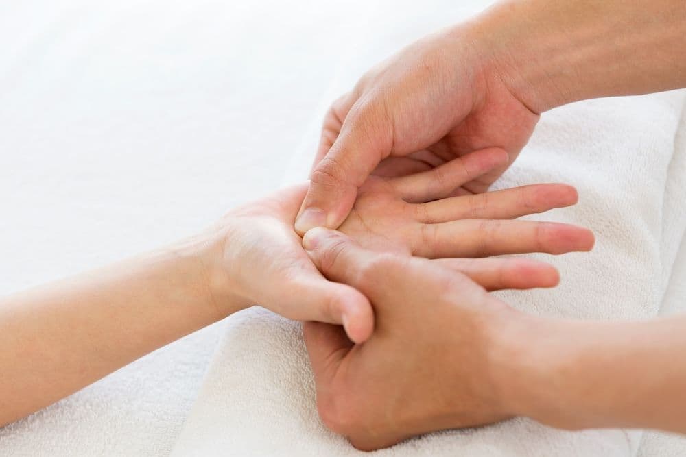 Massage einer Hand